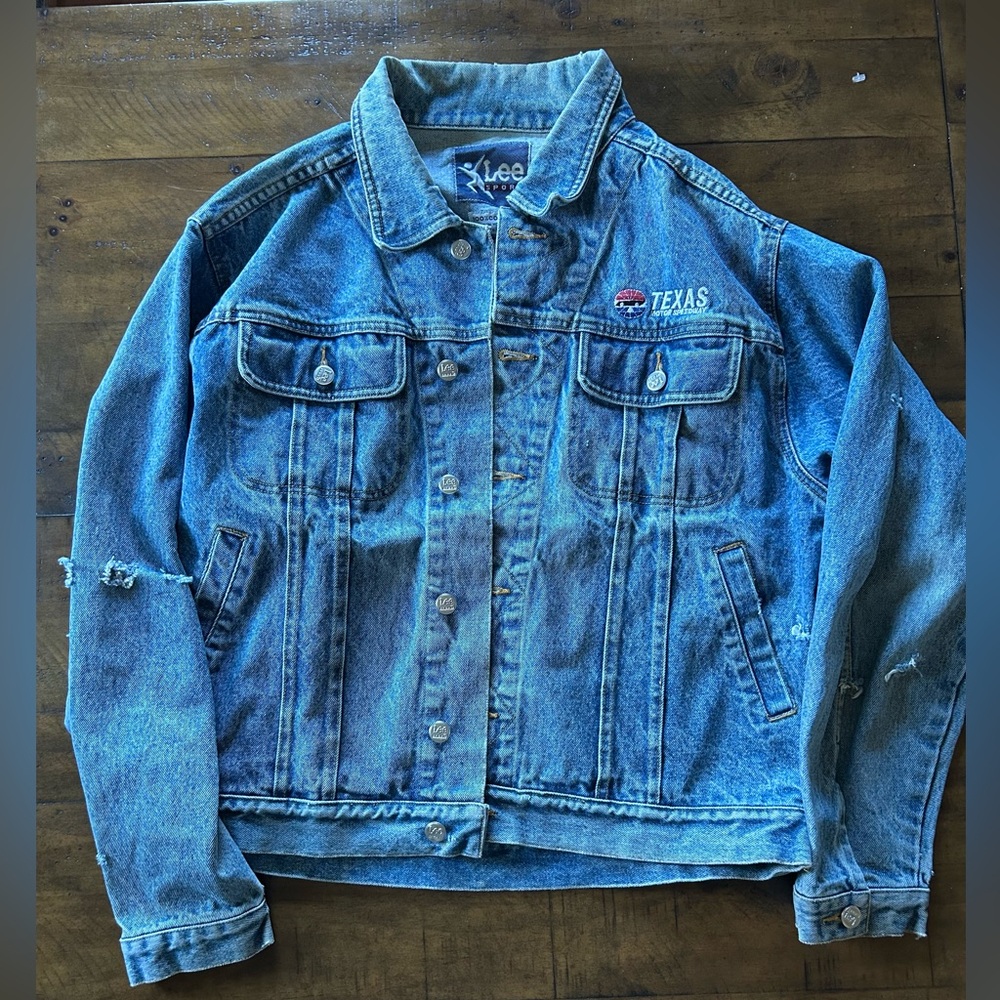 vintage distressed denim jacket with texas motor speedway patch